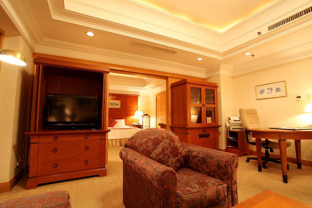 Ruishi Hotel Dalian Quarto foto