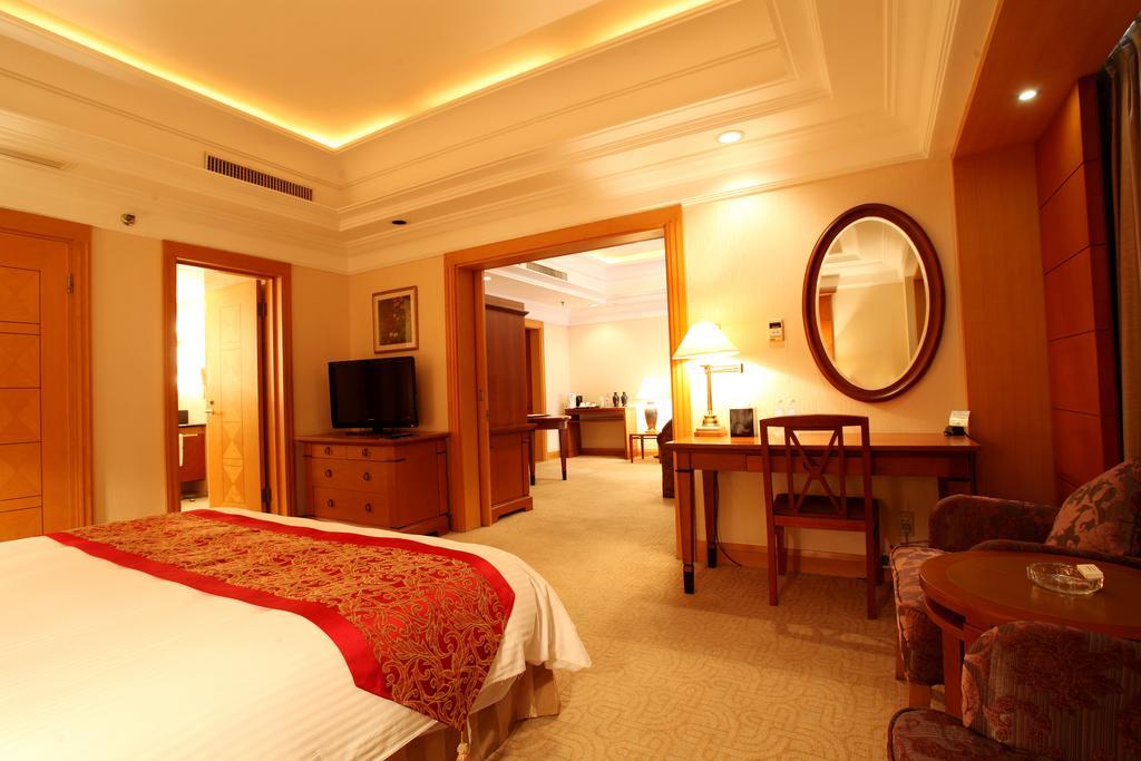 Ruishi Hotel Dalian Quarto foto